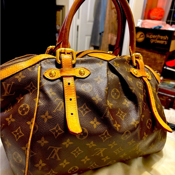 Pampered pre-owned Louis Vuitton Satchel.  Original lining can & a nicked strap.
